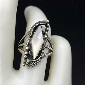 Sterling silver marquis mother of pearl signed ring size 7, 1 inch long